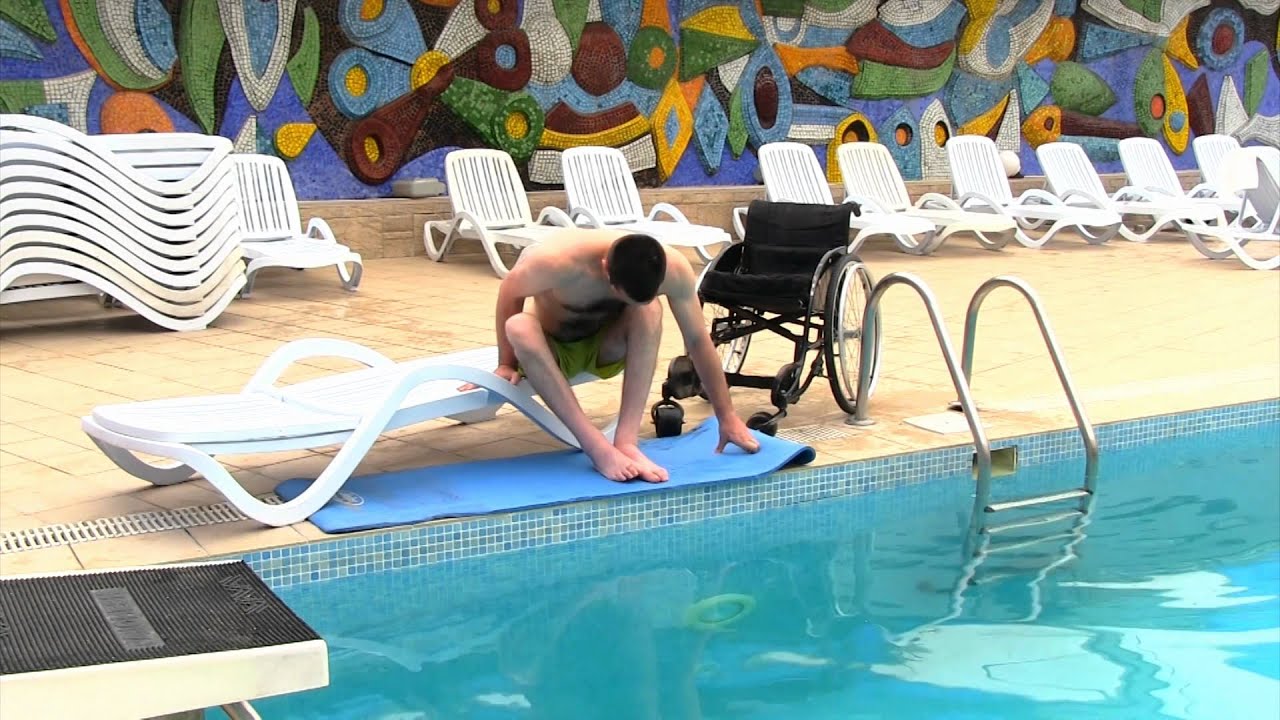 Provide a Transfer Wall wheelchair accessible pool